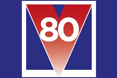 graphic of the number 80 in a red letter V with a blue background
