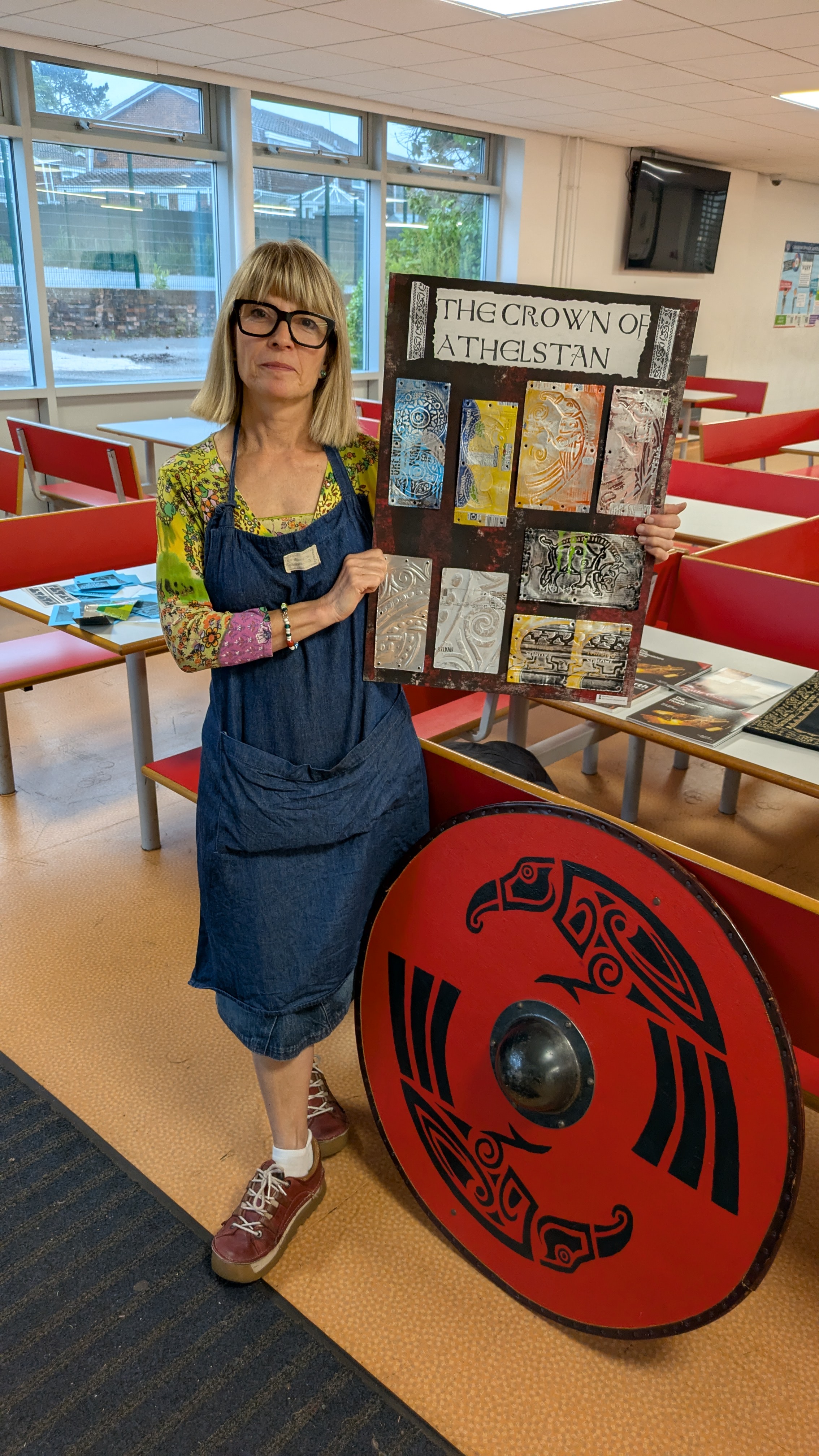image of a crown template and a teacher holding artwork in a classroom