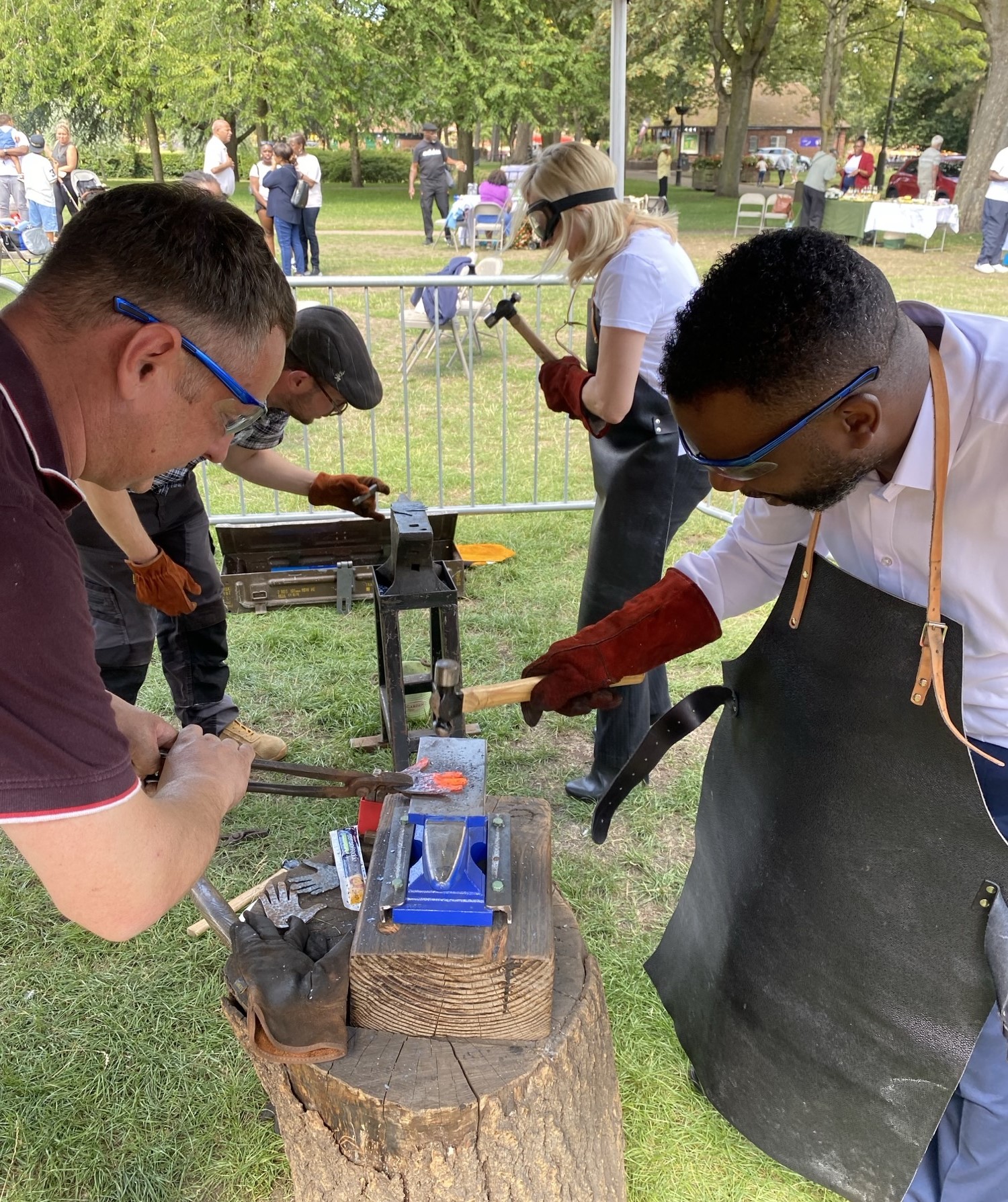 People in a blacksmith workshop