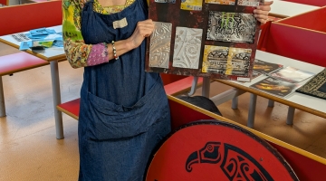 image of a crown template and a teacher holding artwork in a classroom