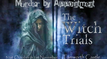 graphic image with dark background of a person in a hooded cloak looking spooky